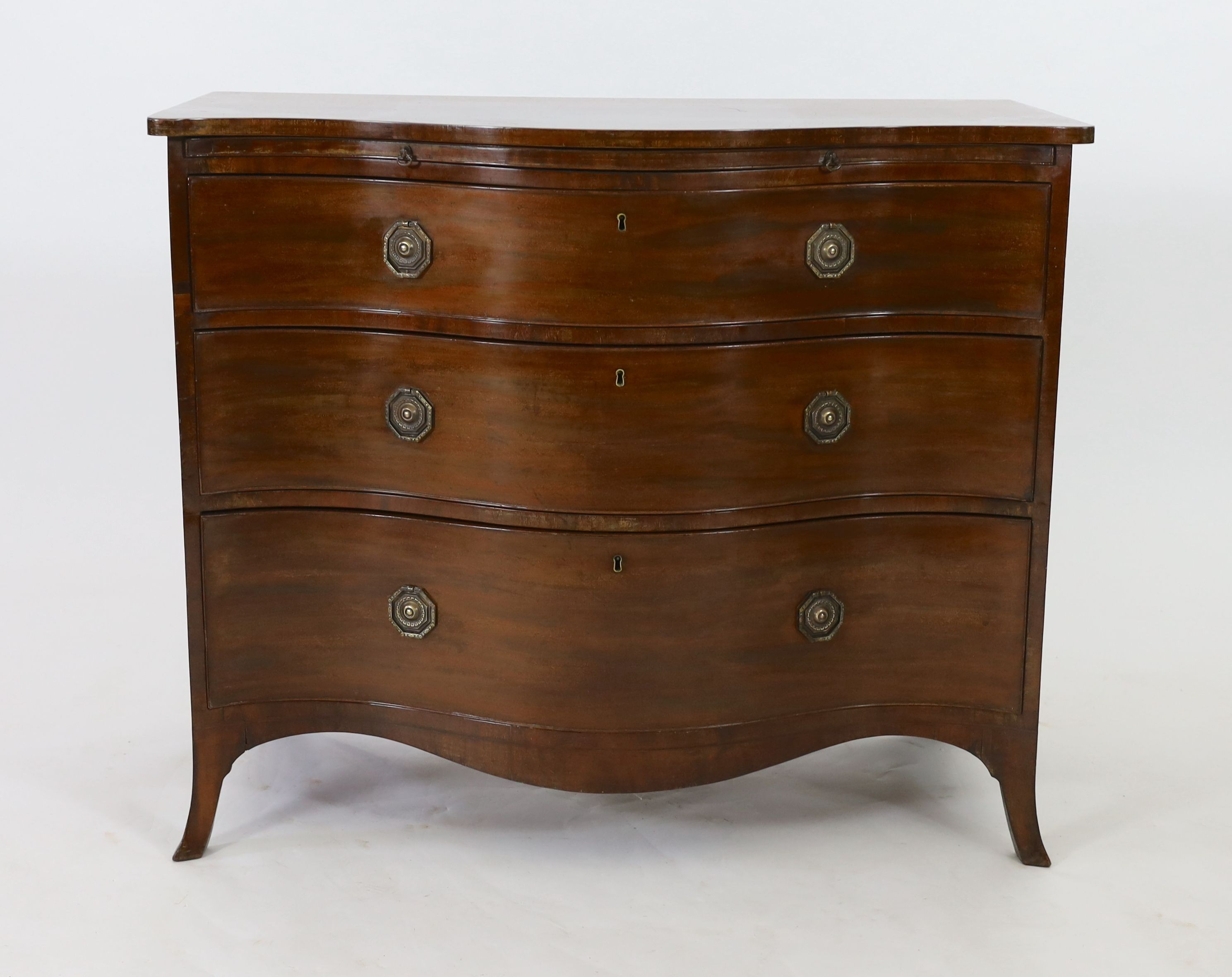 A George III mahogany serpentine chest, W.111cm D.60cm H.93cm